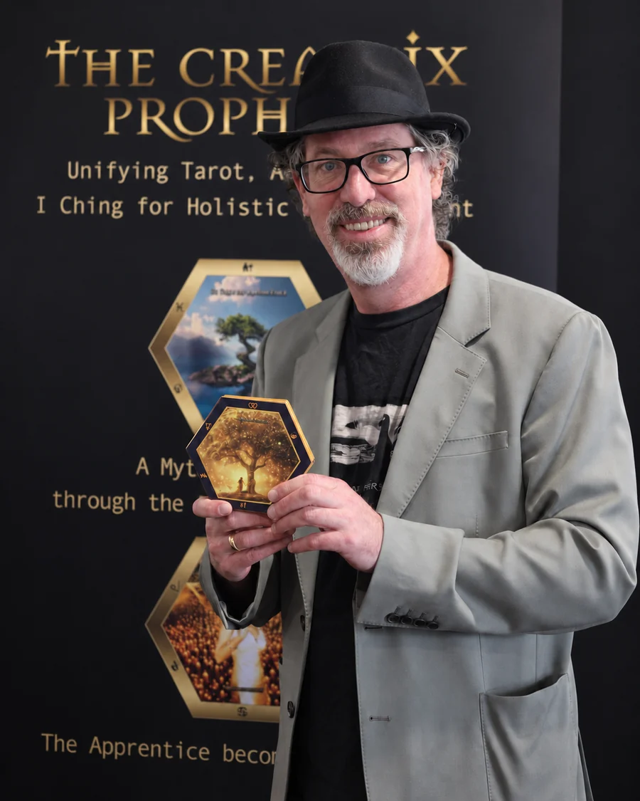 Benjamin Rose holding a hexagonal Creatrix card